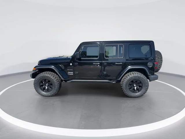 Used 2018 Black Jeep Unlimited Sahara image 4