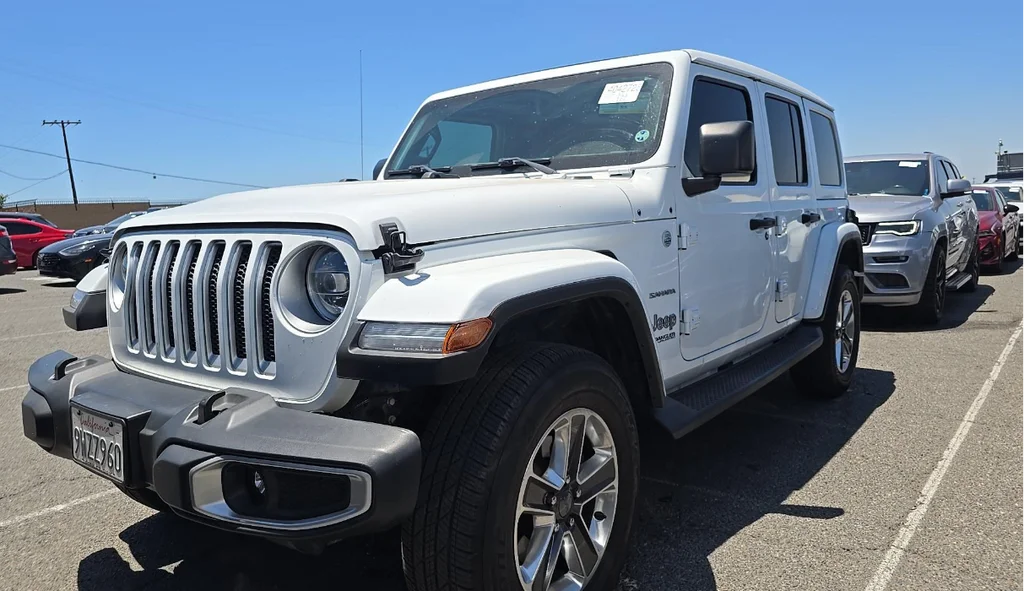 Used 2018 White Jeep Unlimited Sahara image 4