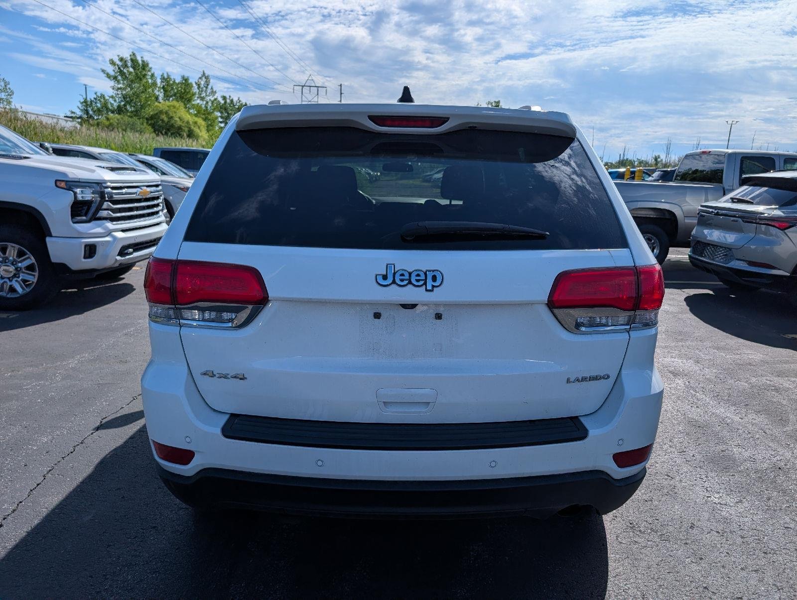 Used 2019 Bright White Clearcoat Jeep Laredo E image 7