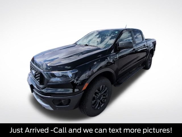 Used 2019 Shadow Black Ford XLT image 1