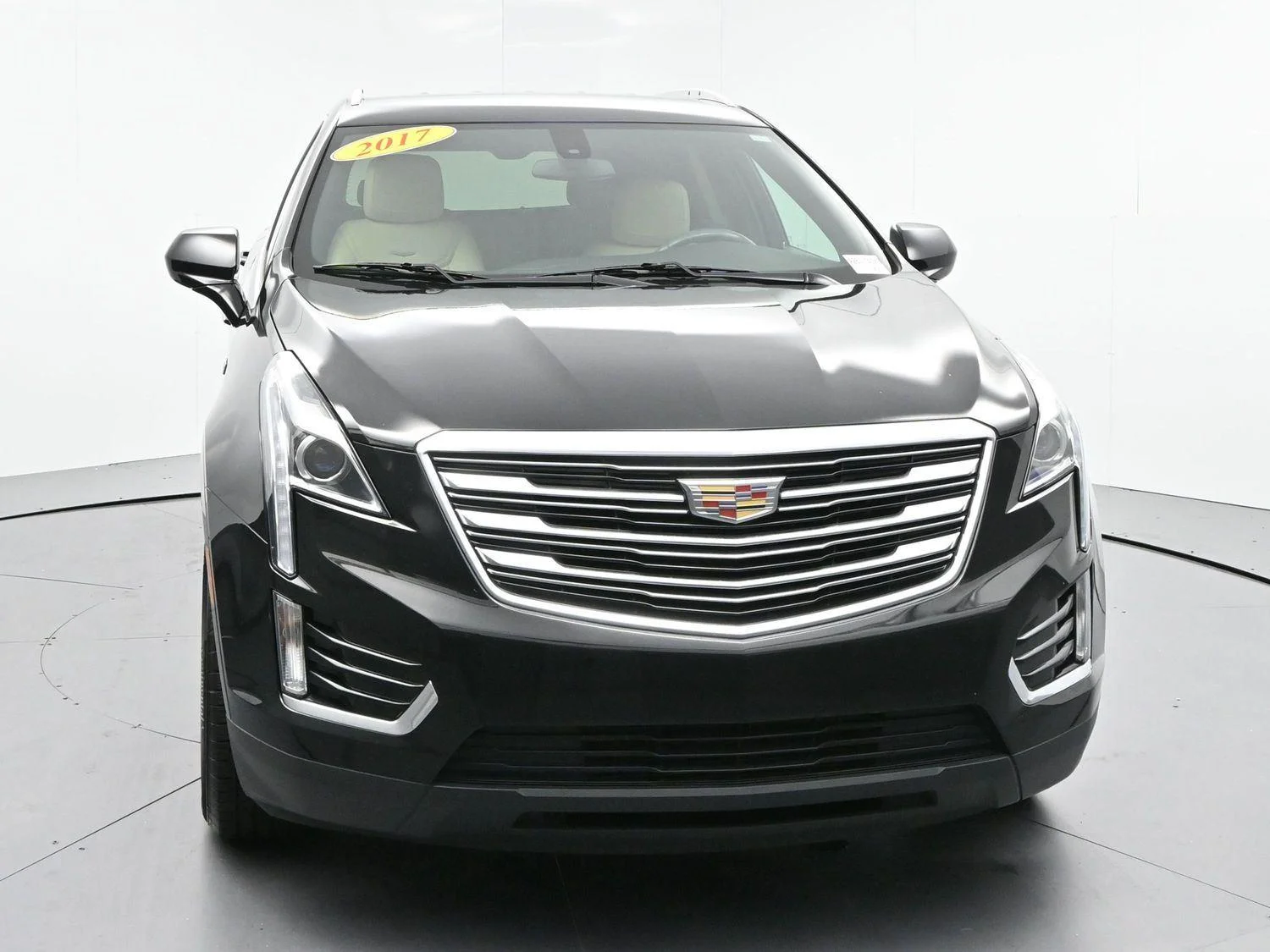 Used 2017 STELLAR BLACK METALLIC Cadillac FWD image 2
