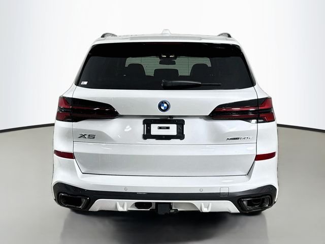 Used 2026 White Metallic BMW xDrive50e image 6
