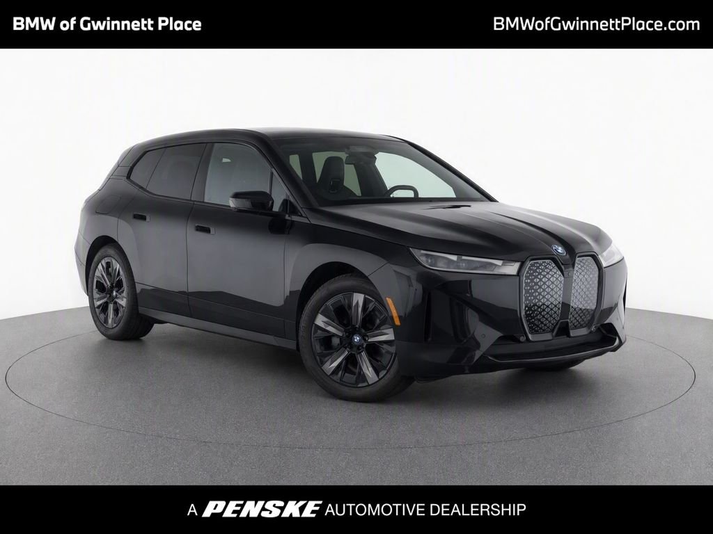 Used 2024 Black Sapphire Metallic BMW xDrive50 image 1