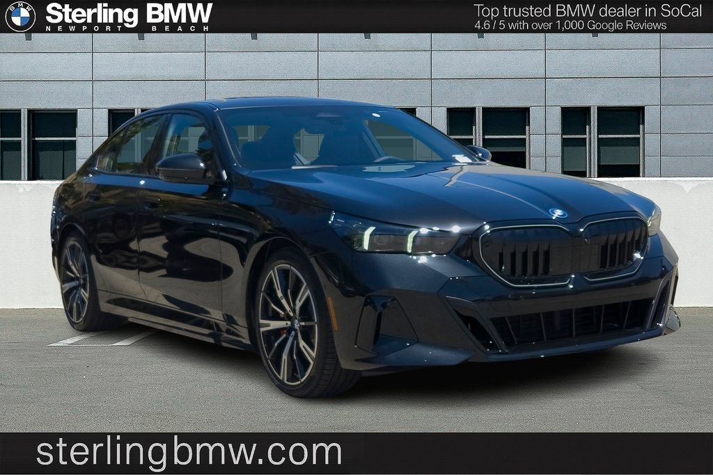 New 2027 Black Sapphire Metallic BMW 550e xDrive image 1