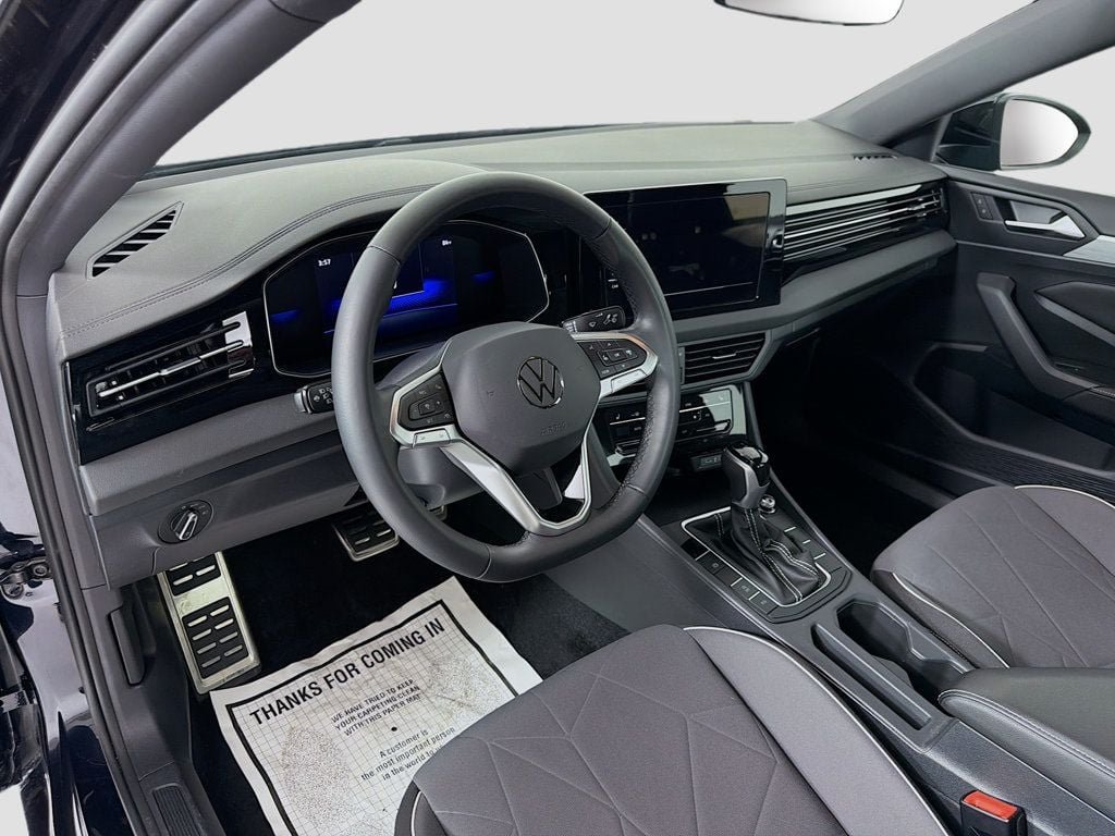 Used 2025 Deep Black Pearl Volkswagen Sport Automatic image 9