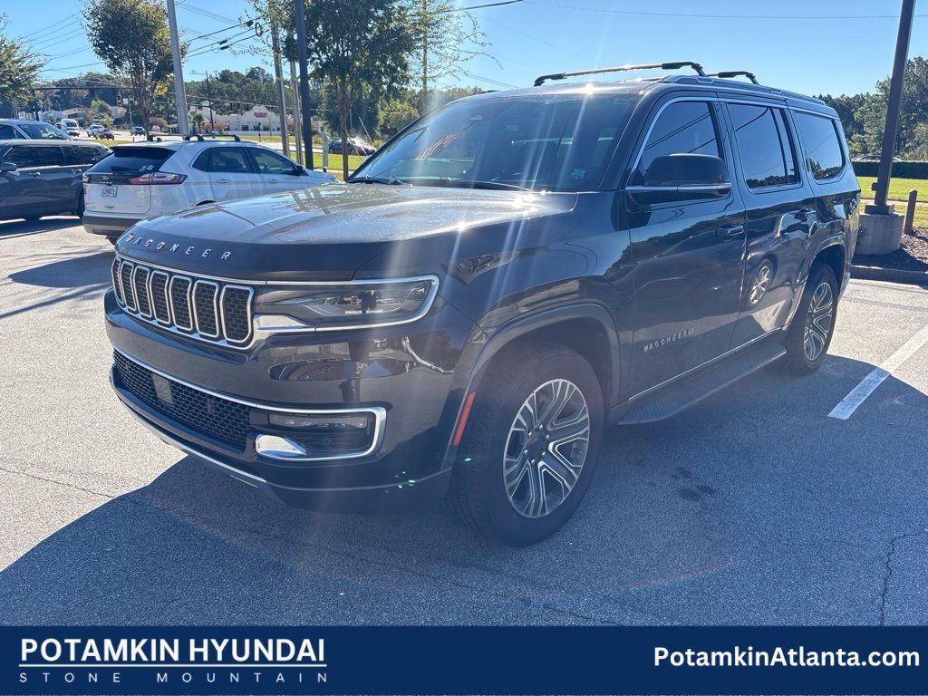 Used 2022 Diamond Black Crystal Pearlcoat Jeep Series III image 1
