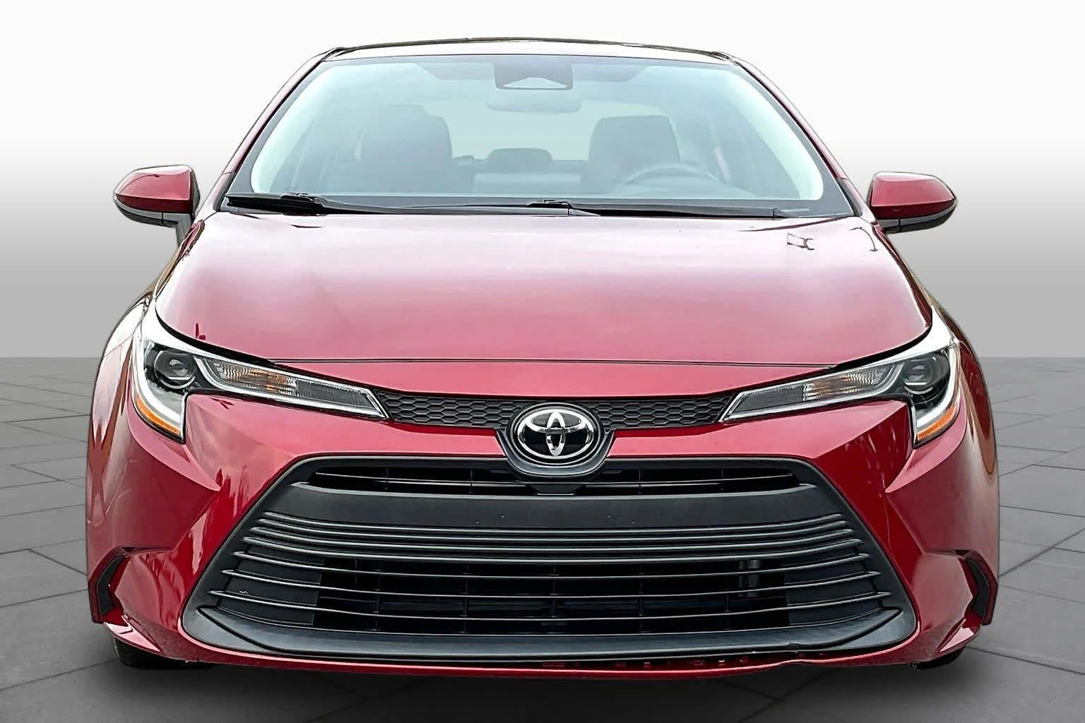 Used 2024 Ruby Flare Pearl Toyota LE image 4