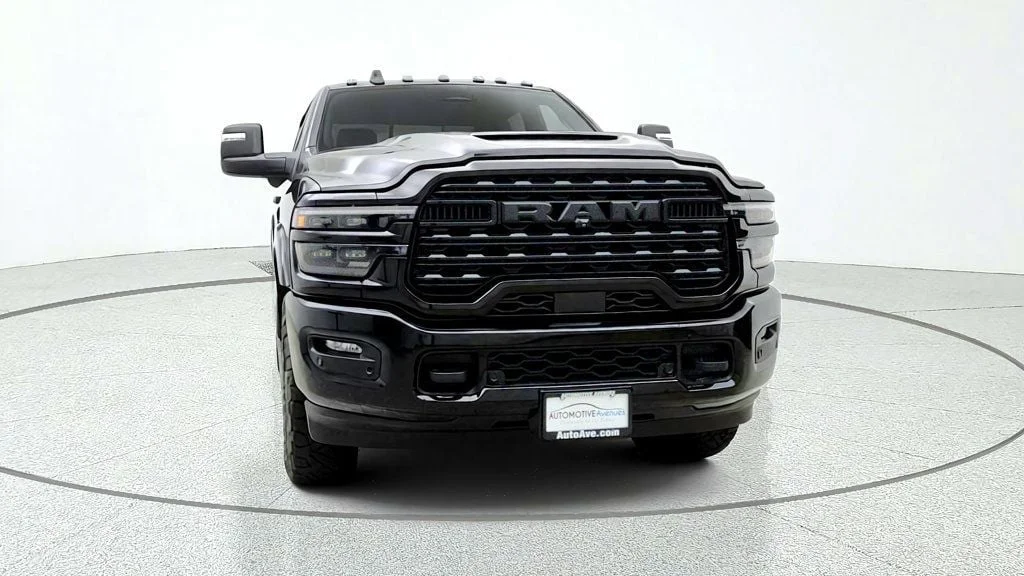 Used 2025 Black Clearcoat Ram Limited 4x4 Crew Cab 6
