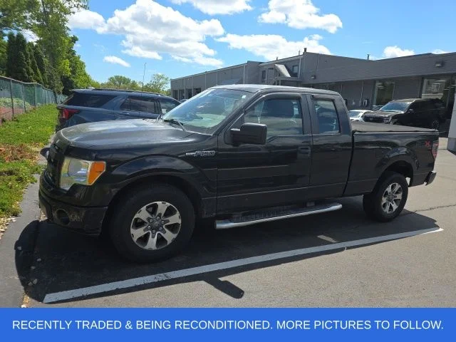 Used 2014 Black Ford STX image 1