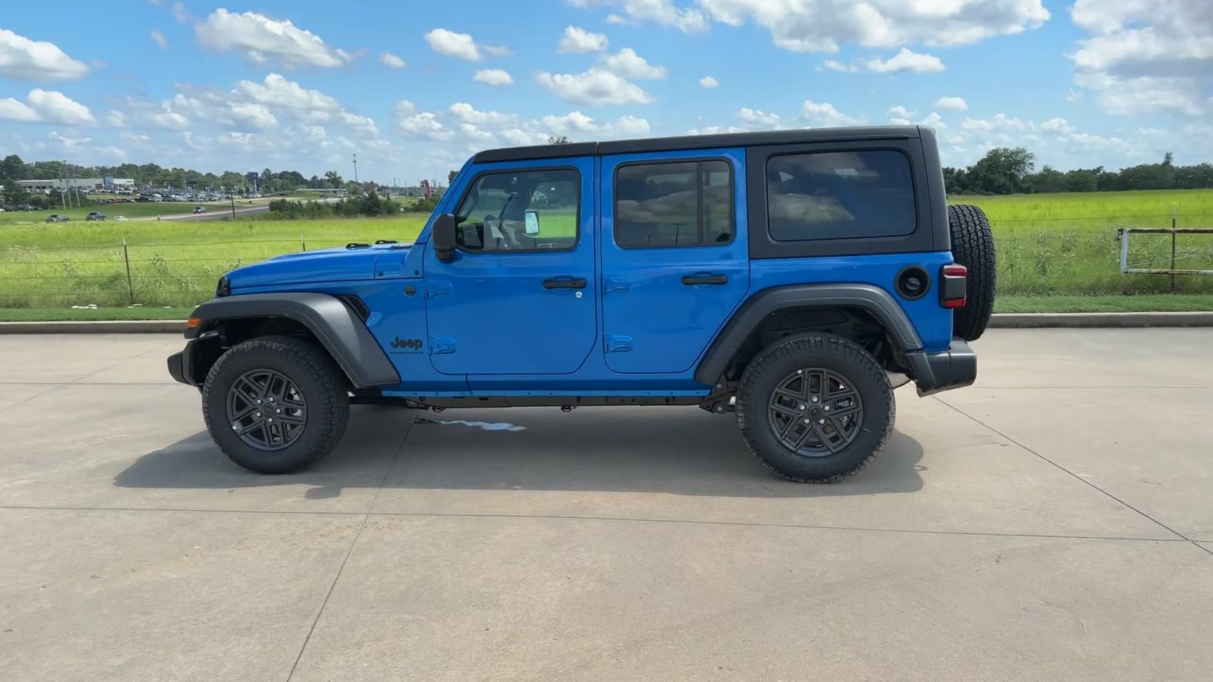 New 2024 Hydro Blue Pearlcoat Jeep Sport S image 5