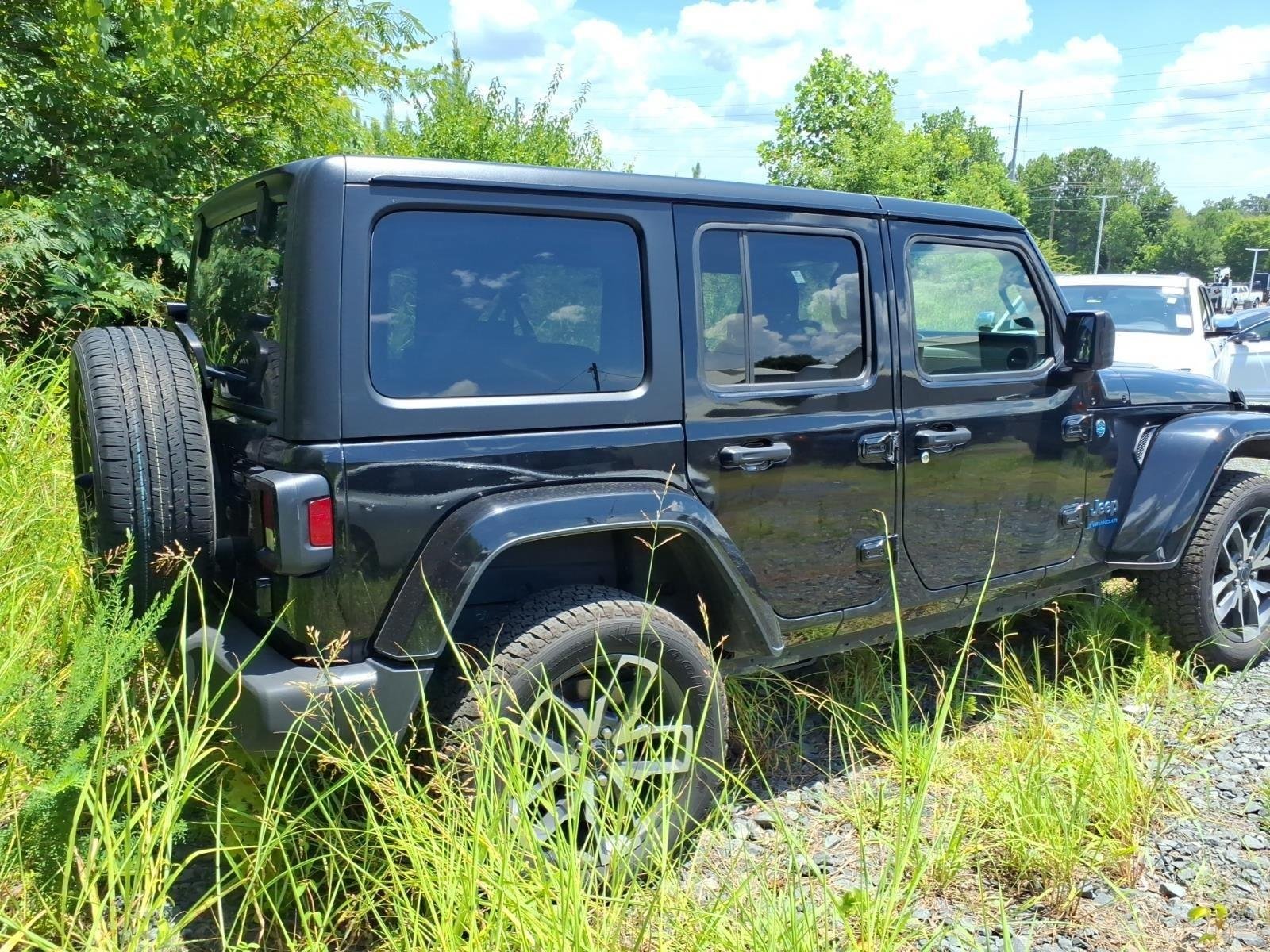 Used 2024 Black Clearcoat Jeep Sport S image 10