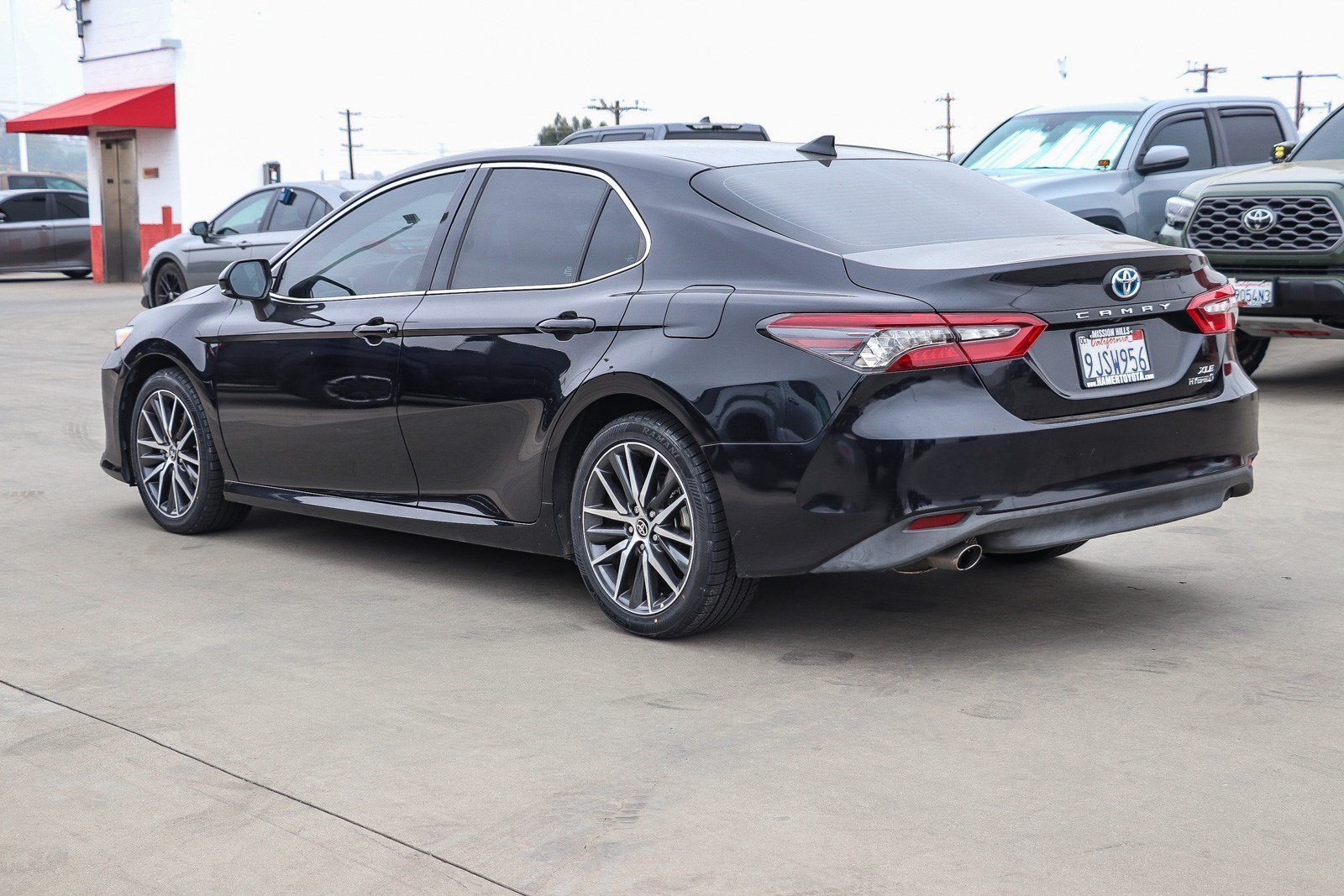 Used 2024 Midnight Black Metallic Toyota Hybrid XLE image 4