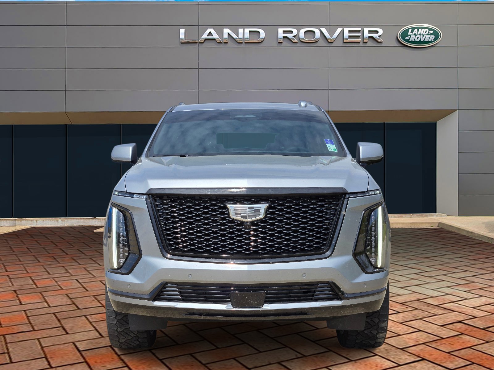 Used 2025 Argent Silver Metallic Cadillac 4WD Sport image 2