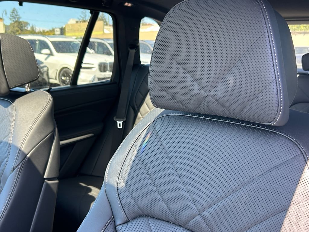 New 2026 Black Sapphire Metallic BMW xDrive50e image 14
