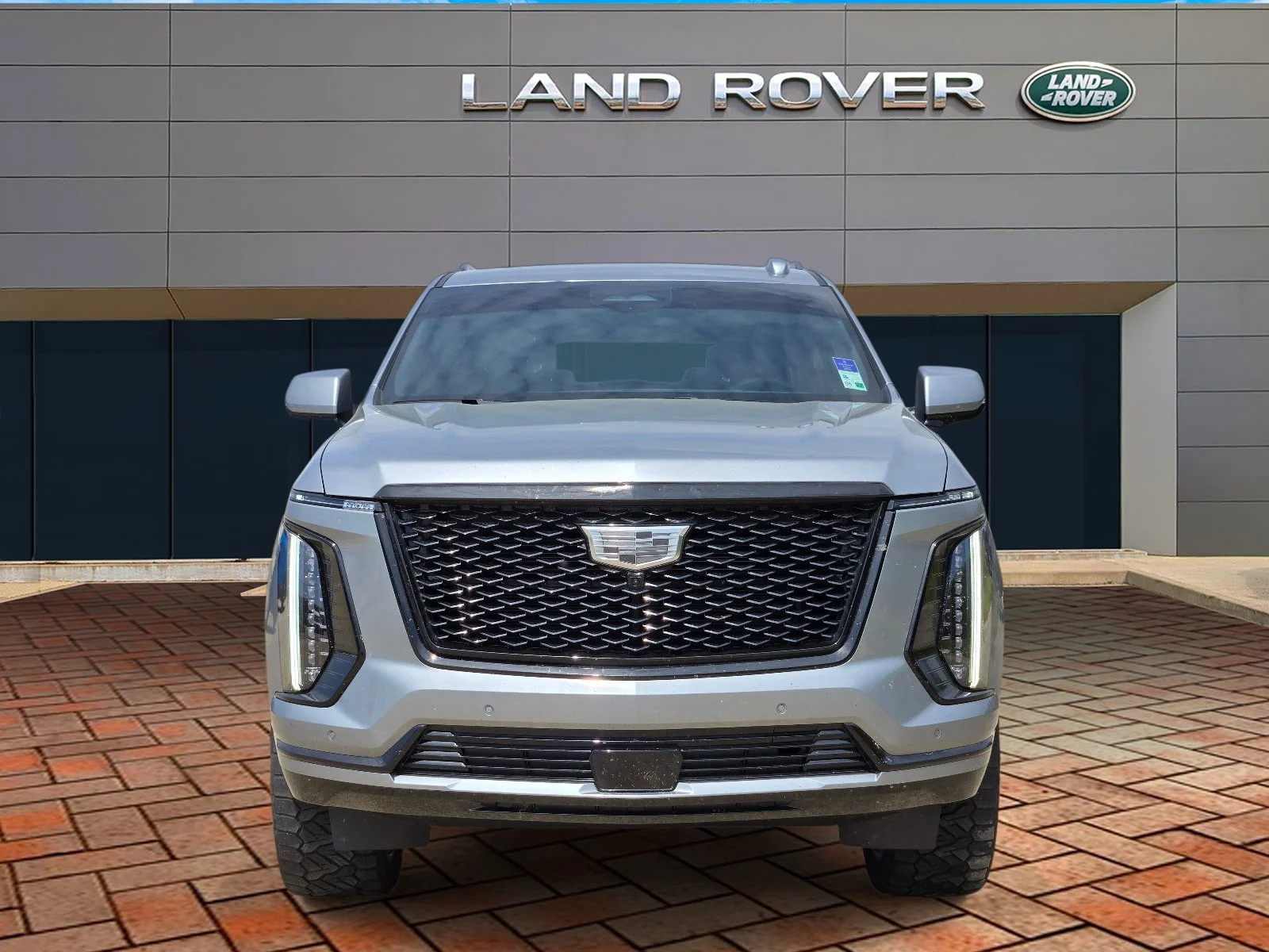 Used 2025 Argent Silver Metallic Cadillac 4WD Sport image 2