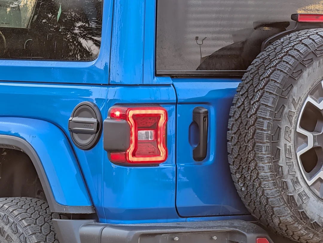 Used 2024 Blue Jeep Sahara - - 4x4 - Leather Seats - Power Soft Top - Remote Start & More! image 11