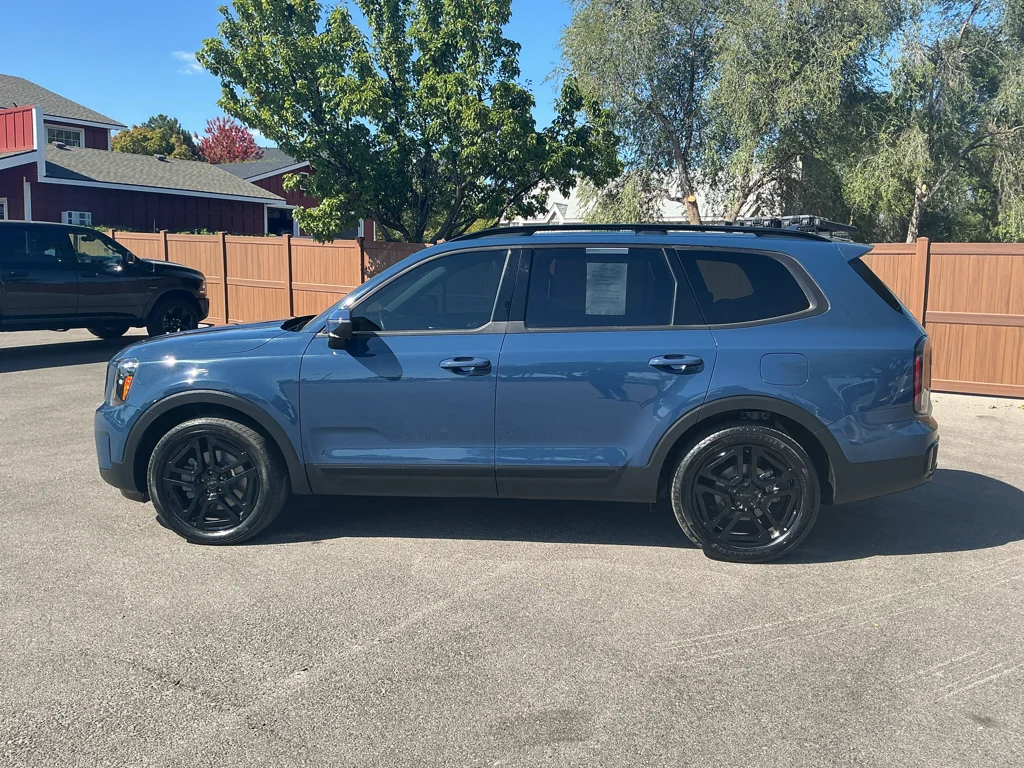 Used 2025 Midnight Lake Blue Kia EX X-Line image 8