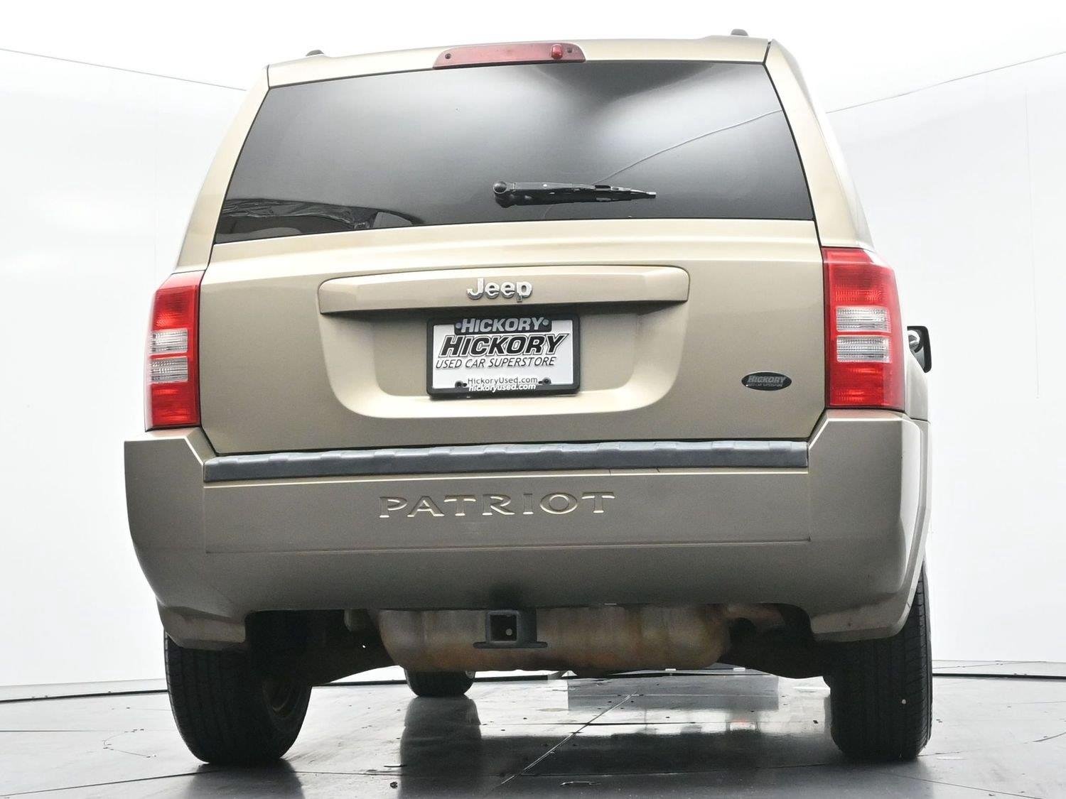 Used 2008 Light Khaki Metallic Jeep Sport image 43