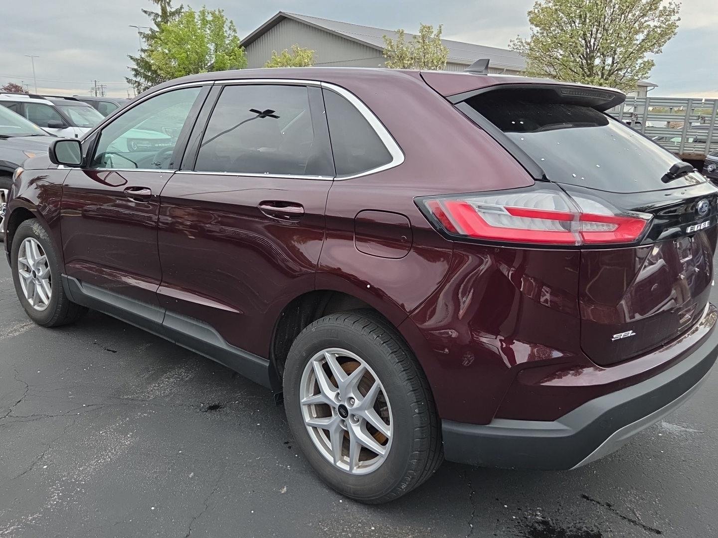 Used 2024 Burgundy Velvet Metallic Tinted Clearcoat Ford SEL image 4