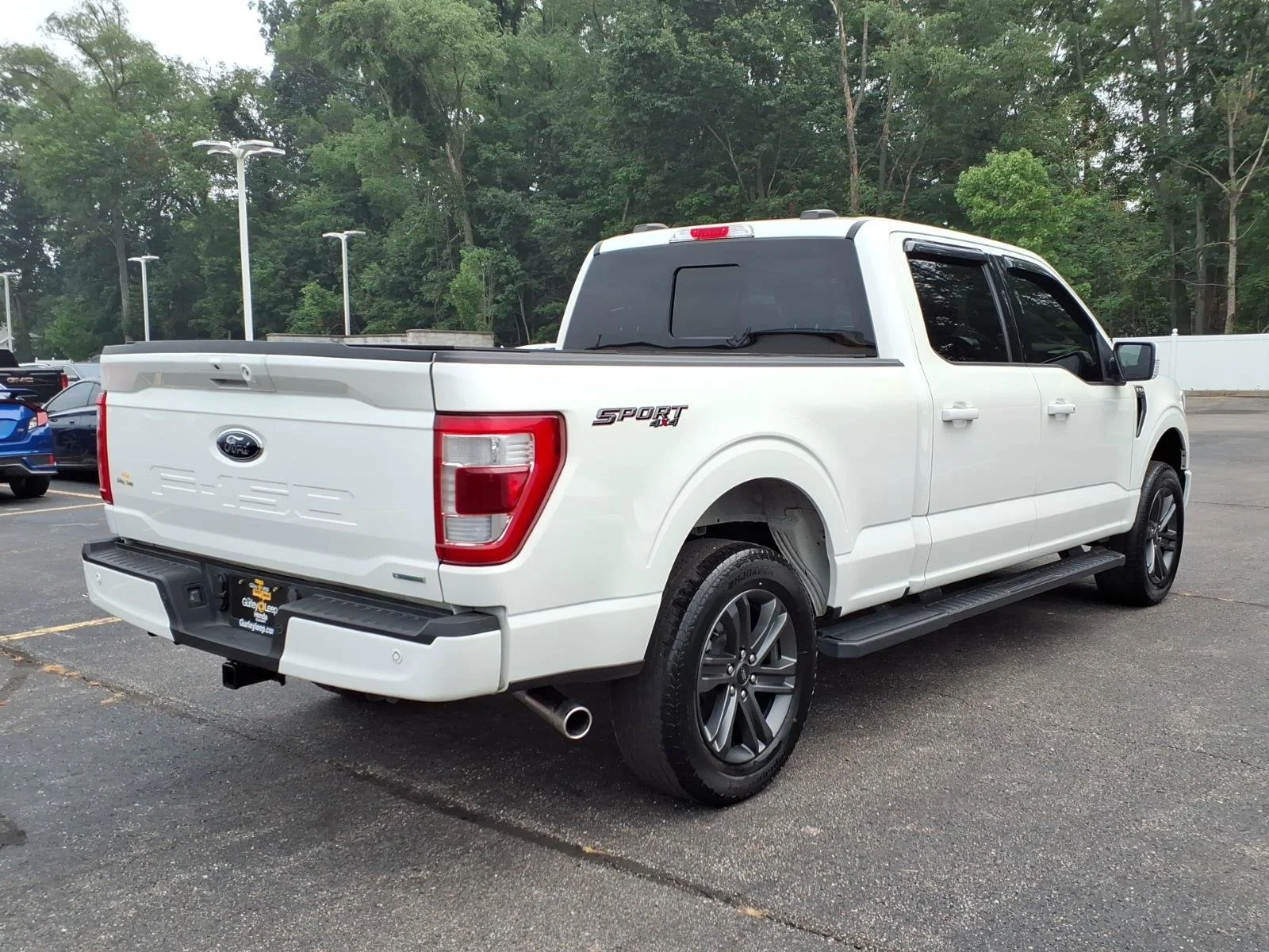 Used 2023 White Metallic Ford LARIAT image 12