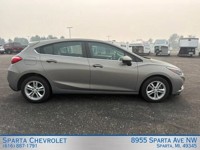 Used 2018 Chevrolet Cruze LT with VIN 3G1BE6SM0JS654352 for sale in Sparta, MI