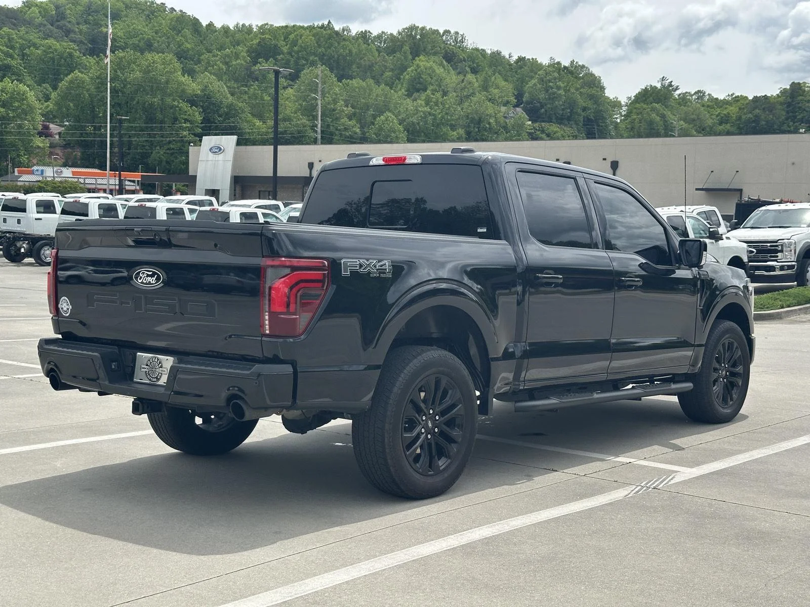 Used 2024 Agate Black Metallic Ford LARIAT image 8
