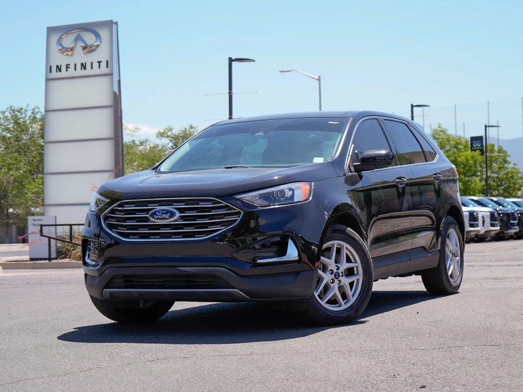 Used 2022 Agate Black Metallic Ford SEL image 1