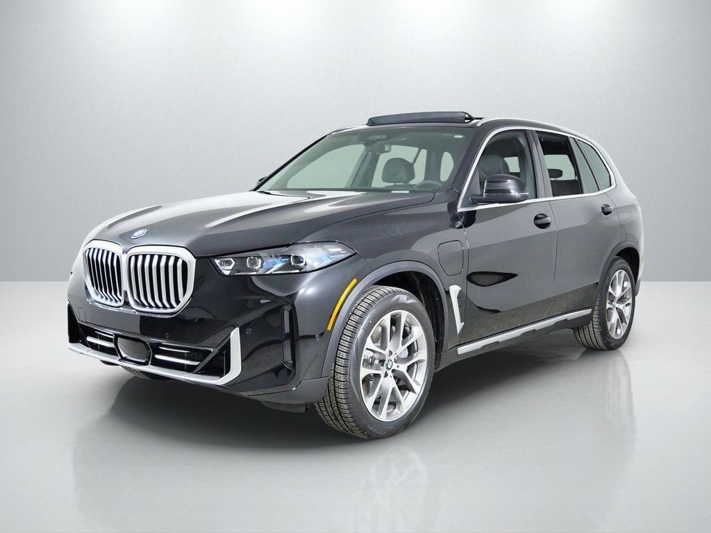 Used 2026 Black Sapphire Metallic BMW xDrive50e image 1