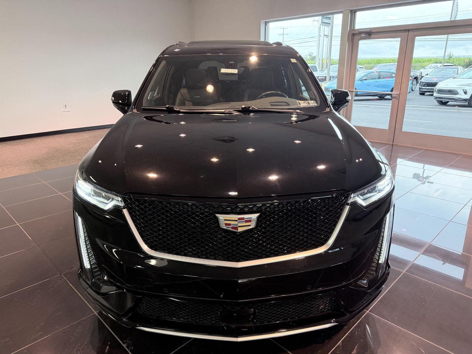 Used 2024 Stellar Black Metallic Cadillac Sport image 16