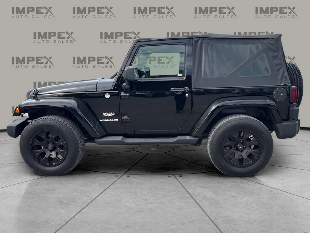 Used 2011 Black Jeep Sahara image 2
