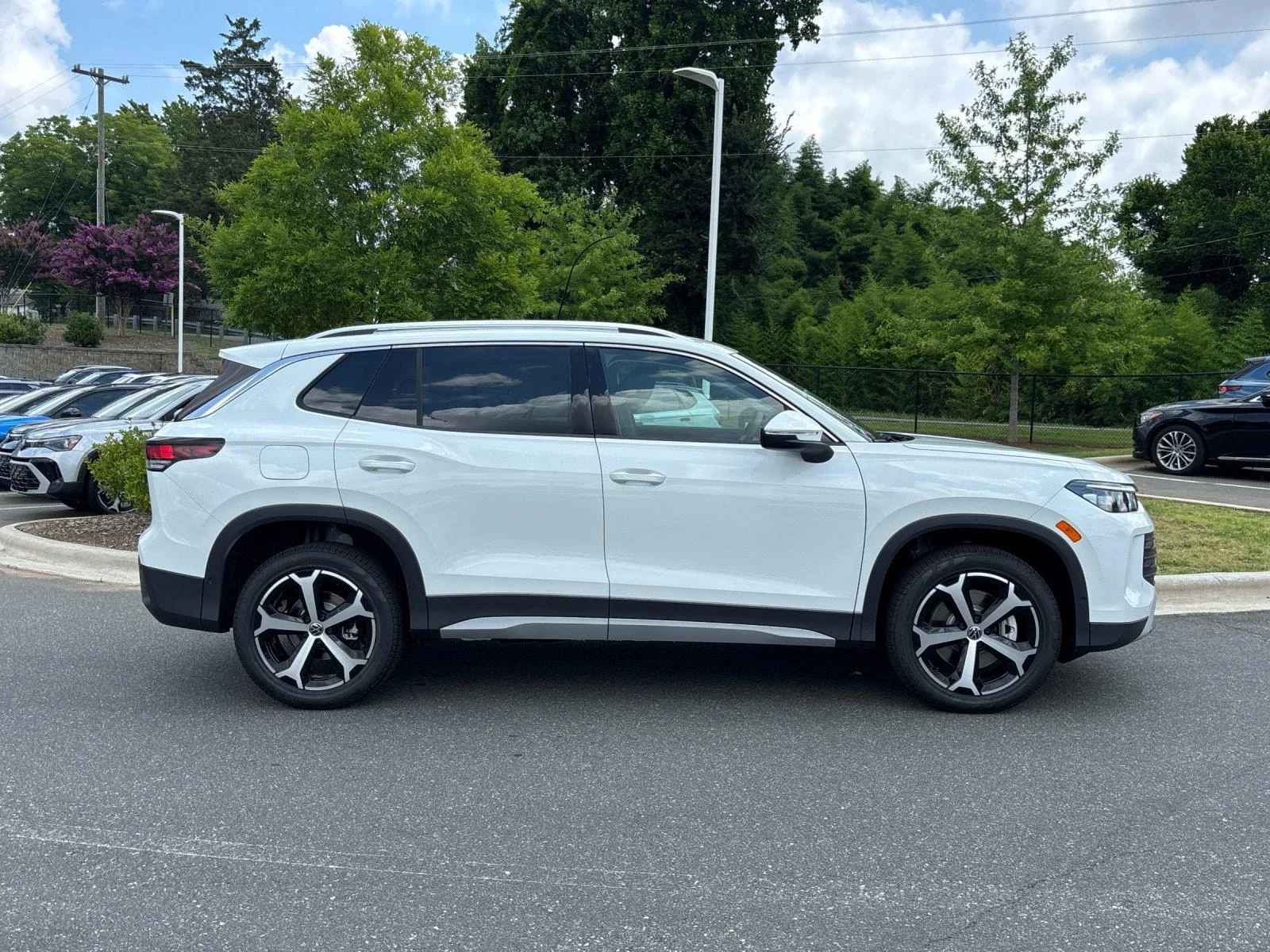 New 2026 pure white Volkswagen SE image 6