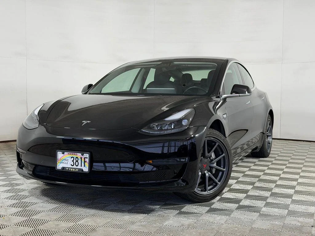 Used 2019 Solid Black Tesla Mid Range image 1