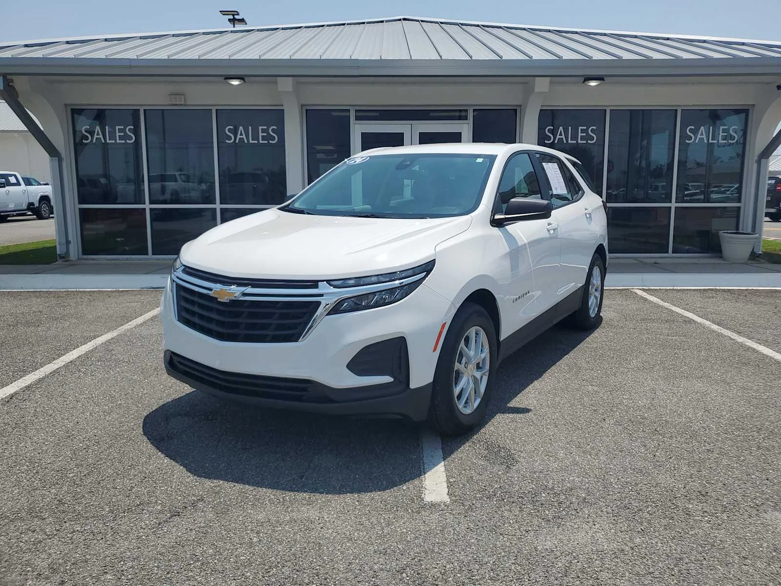 Used 2024 Summit White Chevrolet LS image 1