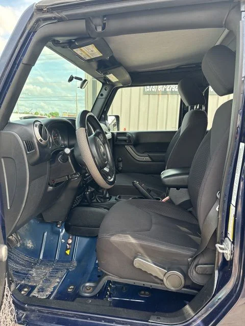 Used 2013 Blue Jeep Unlimited Sport image 12