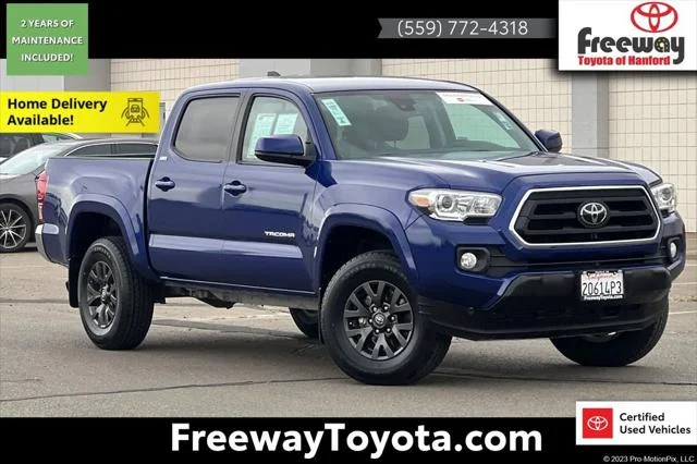 Certified Used 2023 BLUE CRUSH METALLIC Toyota  image 1