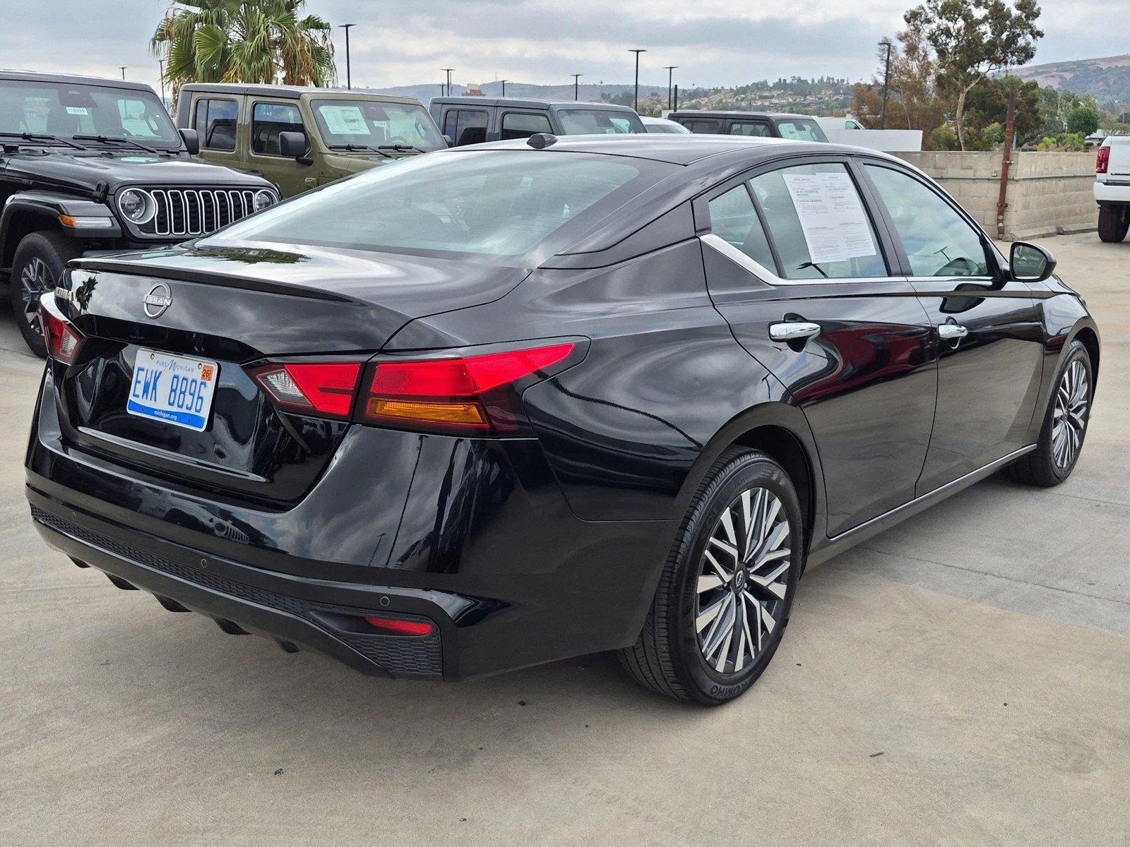 Used 2025 Super Black Nissan SV image 6