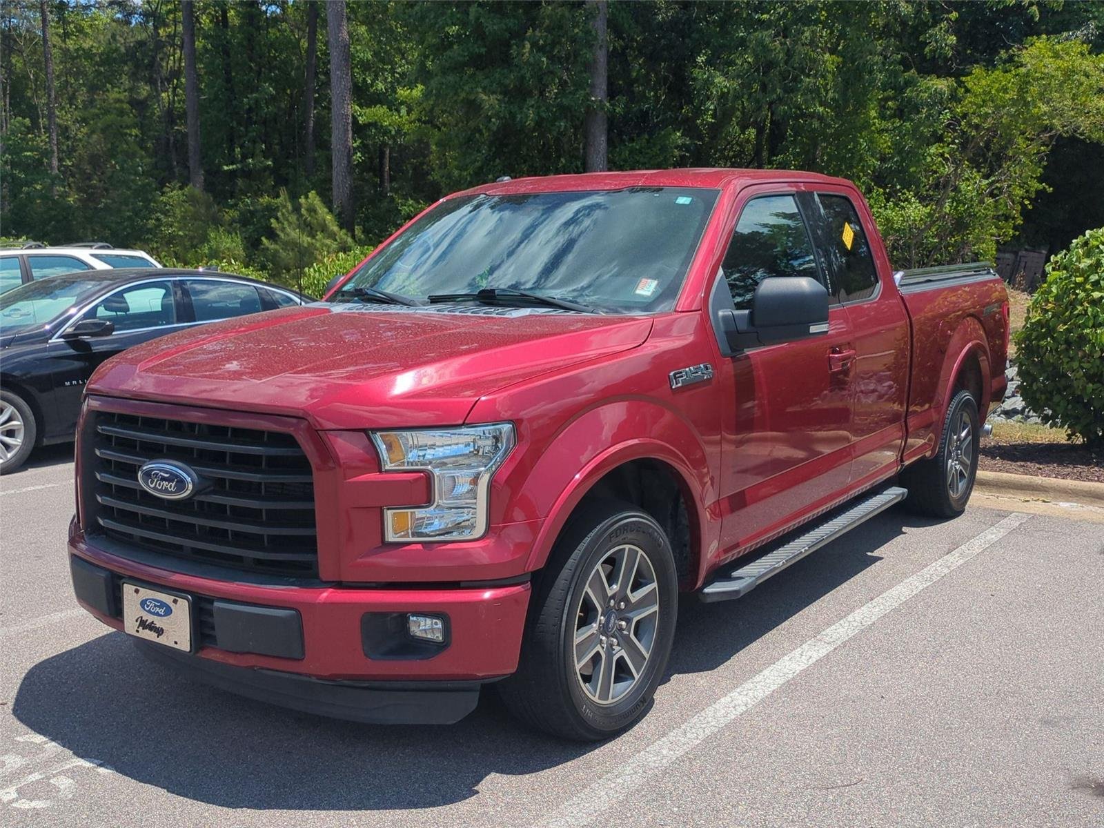Used 2016 Ruby Red Metallic Tinted Clearcoat FORD  image 1