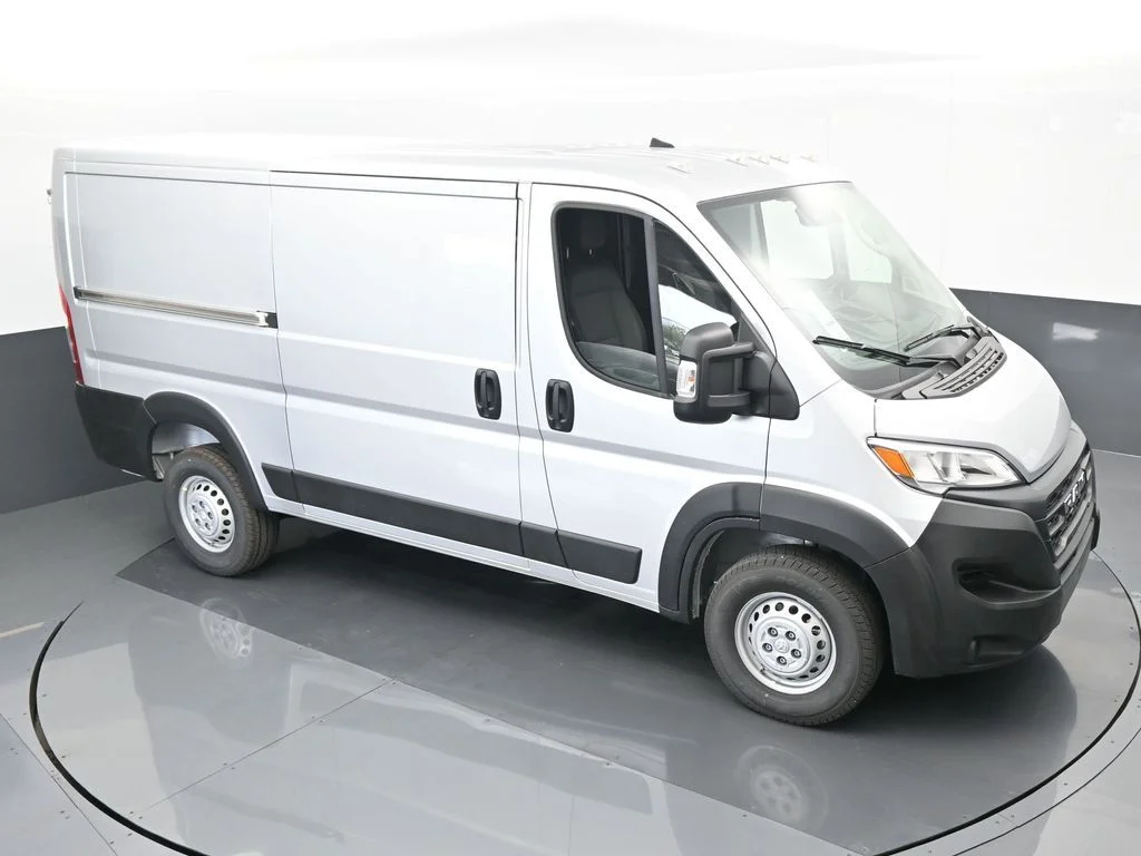 Used 2025 Bright Silver Clearcoat Metallic Ram Low Roof image 45