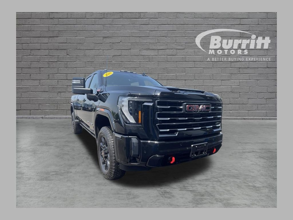 Used 2024 Black GMC AT4 image 1