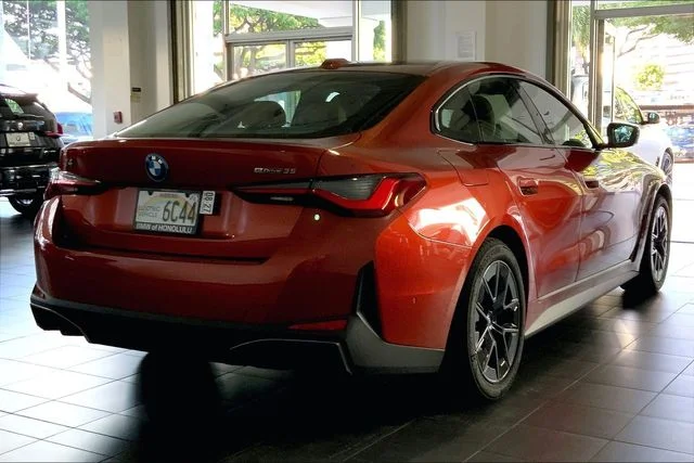 Used 2023 Sunset Orange Metallic BMW eDrive35 image 6