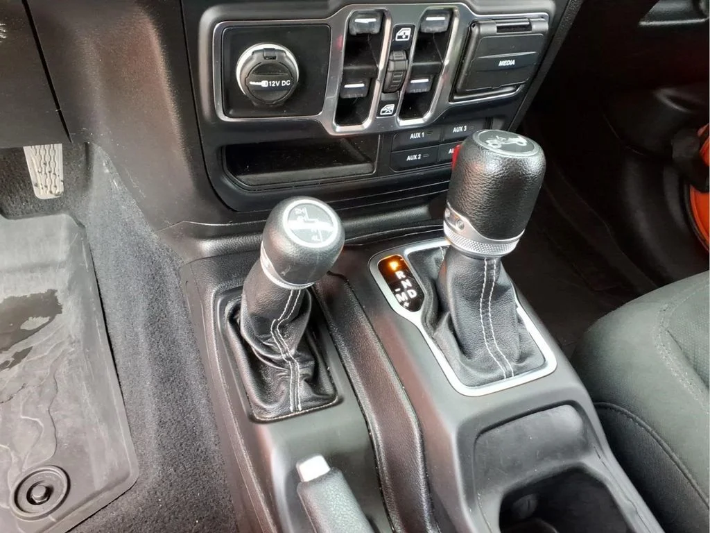 Used 2018 Orange Jeep Unlimited Sahara image 23