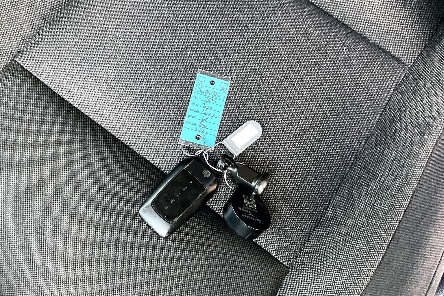 Used 2025 Reservoir Blue Toyota LE image 15
