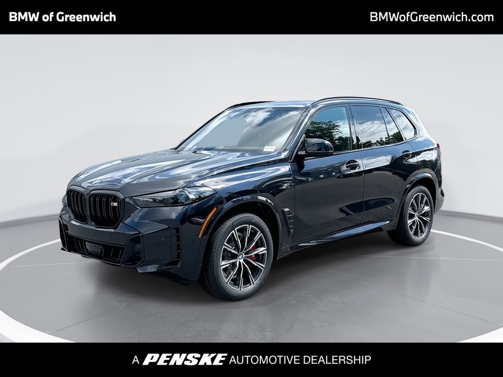 New 2026 Black BMW M60i image 1