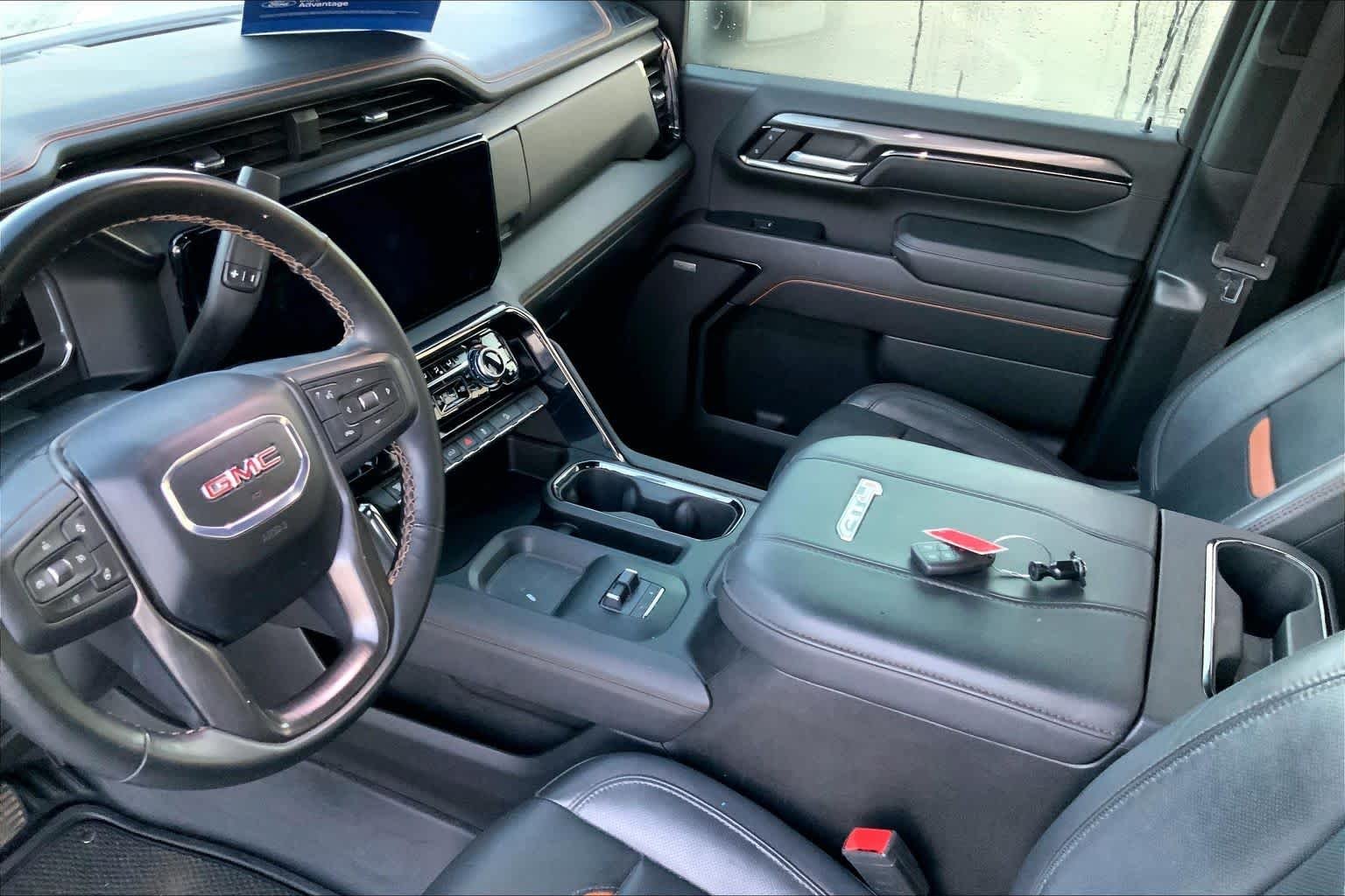 Used 2024 Thunderstorm Gray GMC AT4 image 16