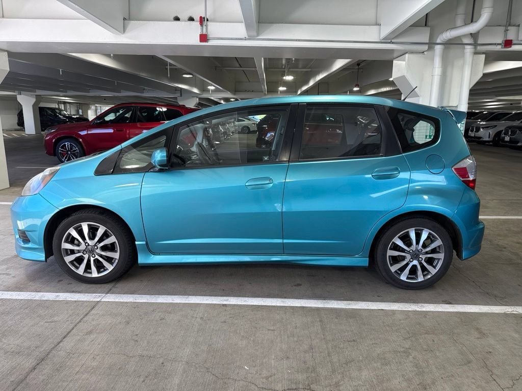 Used 2013 Blue Raspberry Metallic Honda Sport image 4