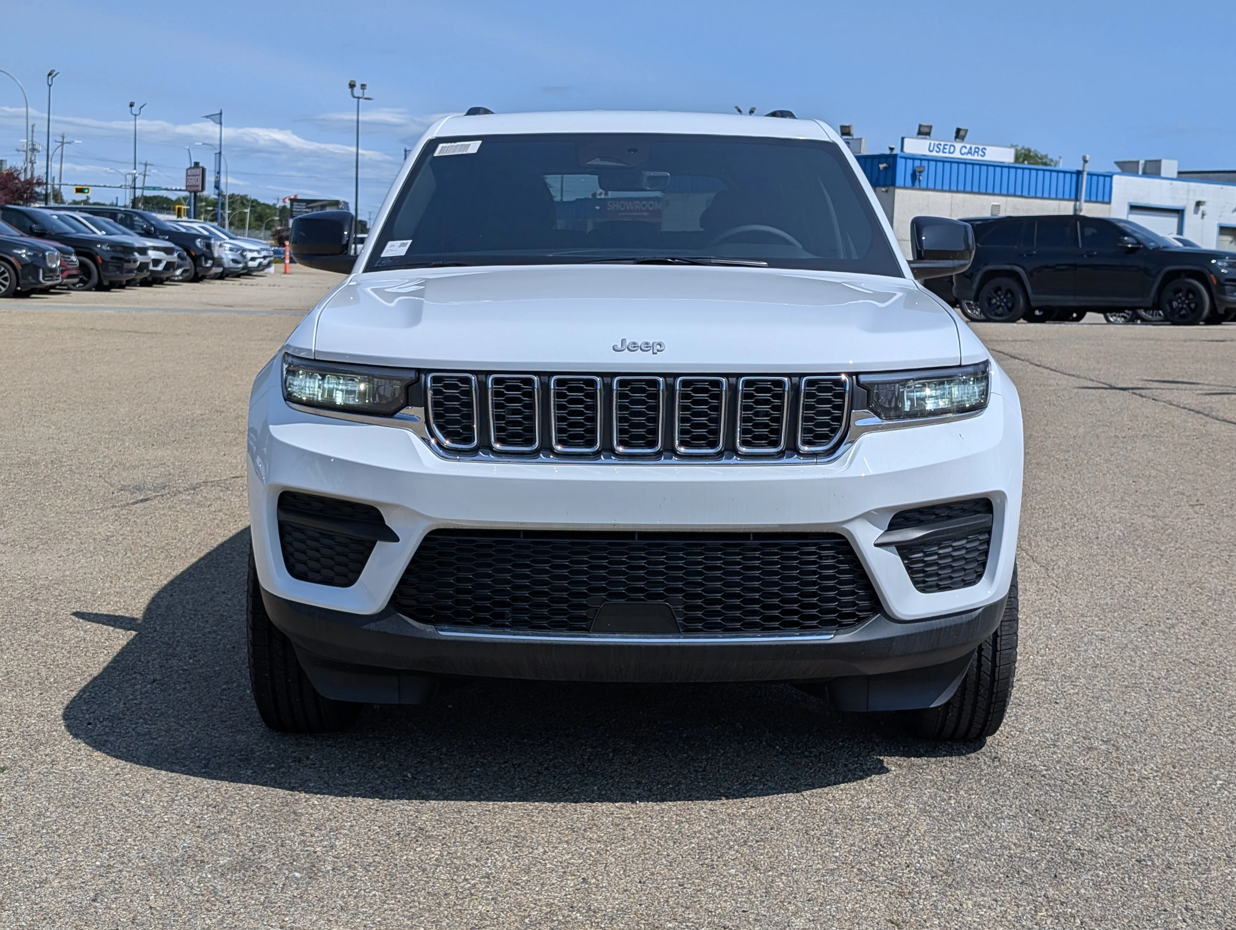 New 2025 Bright White Jeep Laredo image 10