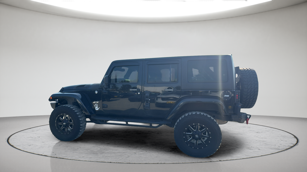 Used 2015 Black Jeep Unlimited Sahara image 9