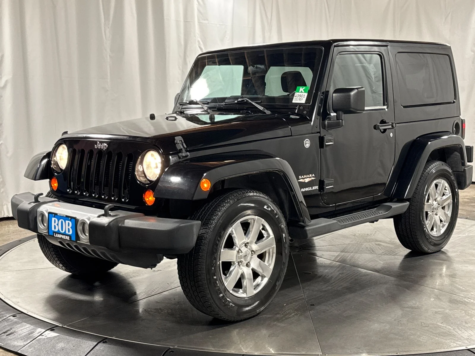 Used 2012 Black Clearcoat Jeep Sahara image 1