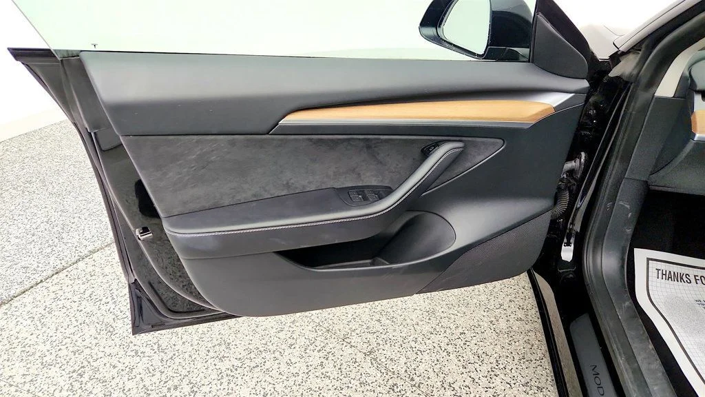 Used 2023 Solid Black Tesla RWD image 11
