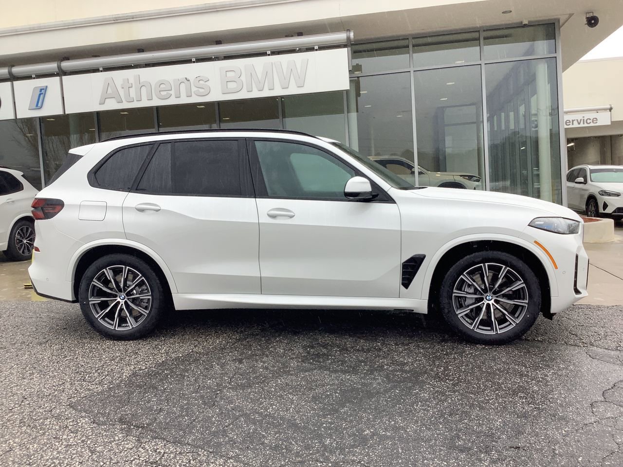 Used 2026 Mineral White Metallic BMW xDrive50e image 9